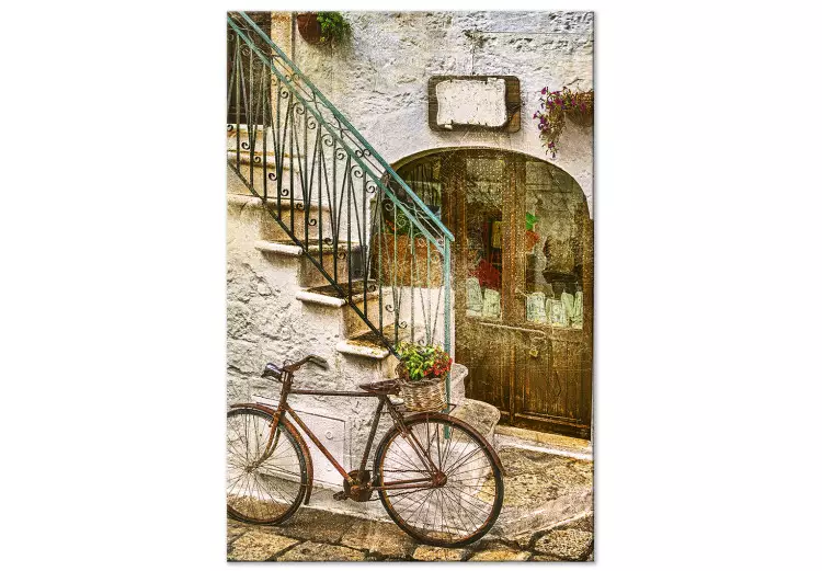 Een fiets bij de stenen trap - een foto van een Italiaanse stad