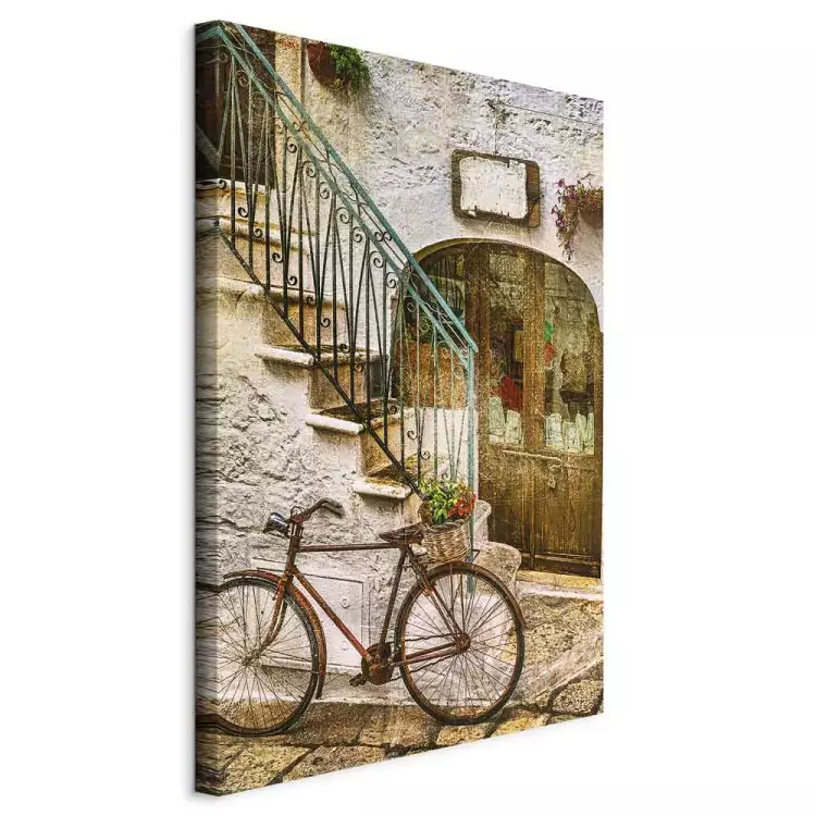 Een fiets bij de stenen trap - een foto van een Italiaanse stad