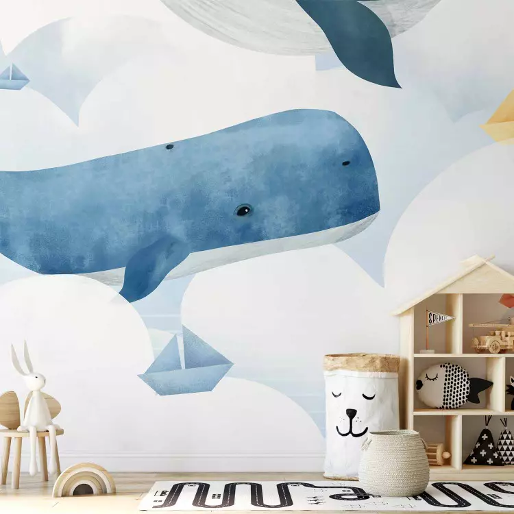 Walvissen zwemmen in de wolken - kleurenillustratie met vissen en schepen
