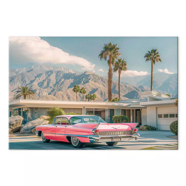 Retro Cadillac - klassieke auto tegen een achtergrond van bergen en palmbomen