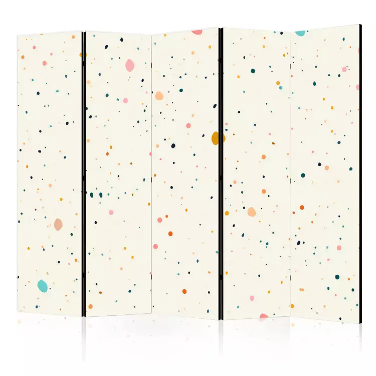 Terrazzo vlekken - patroon met veelkleurige stippen op een beige achtergrond